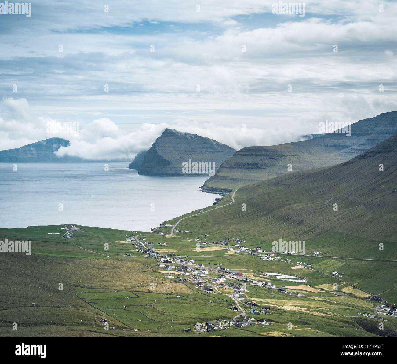 Faroe Islands Panoramic view from Kap Enniberg to the small village Vidareidi, its fjords, Kunoy island and mountains Stock Photo