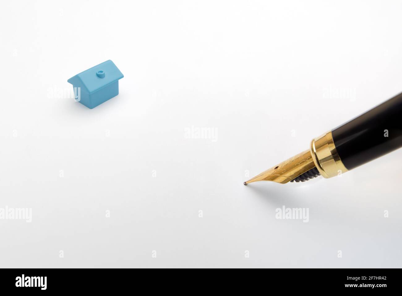 Empty template document signature pen house contract signing papers. Model home real estate property rent buy sale house loan signing pen document Stock Photo