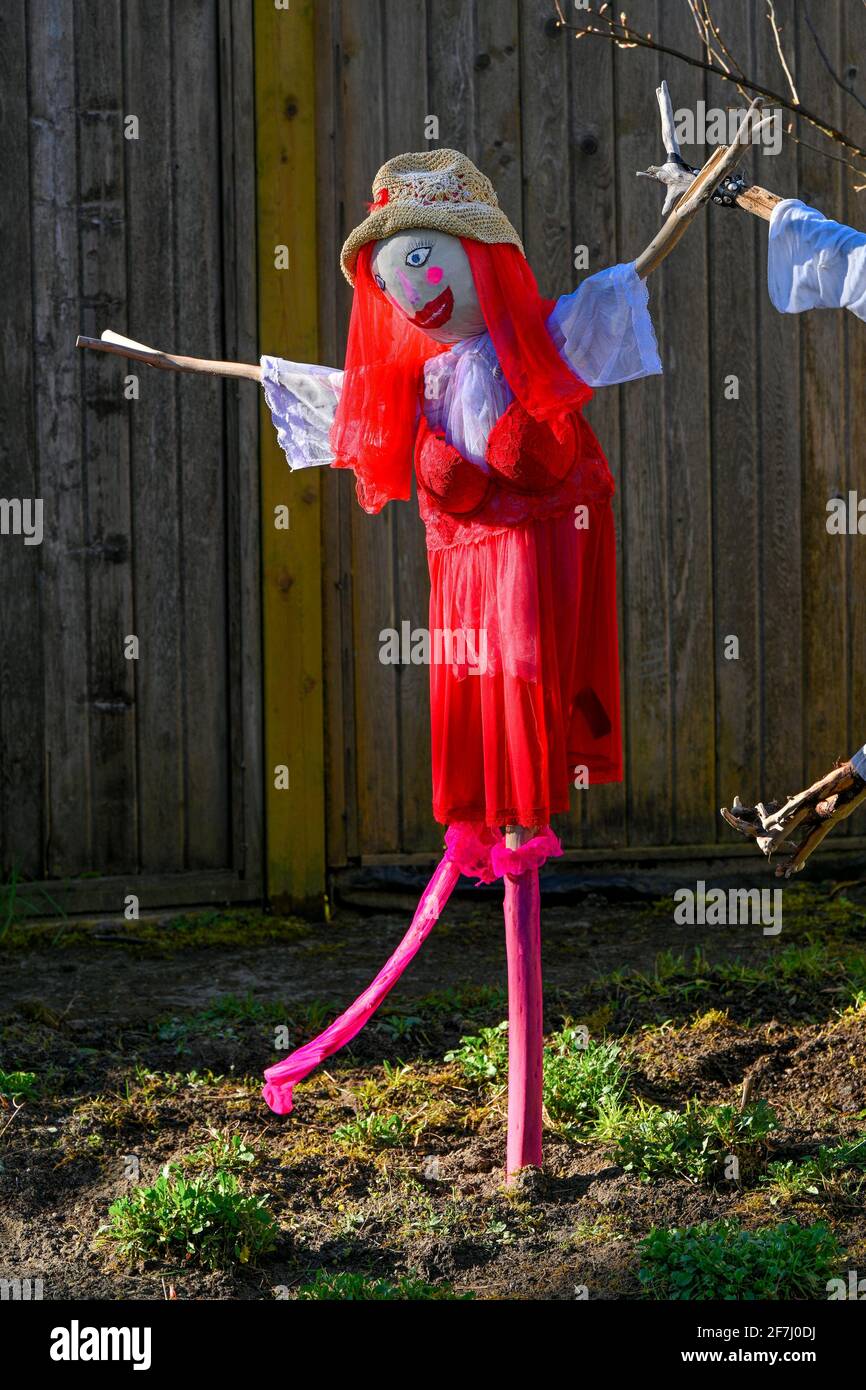 Scarecrow couple in garden Stock Photo