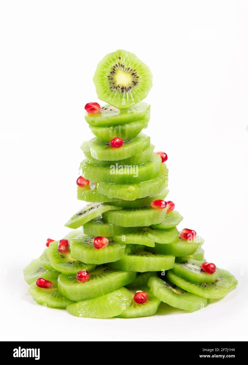 Christmas tree fruit salad with kiwi and pomegranate Stock Photo Alamy