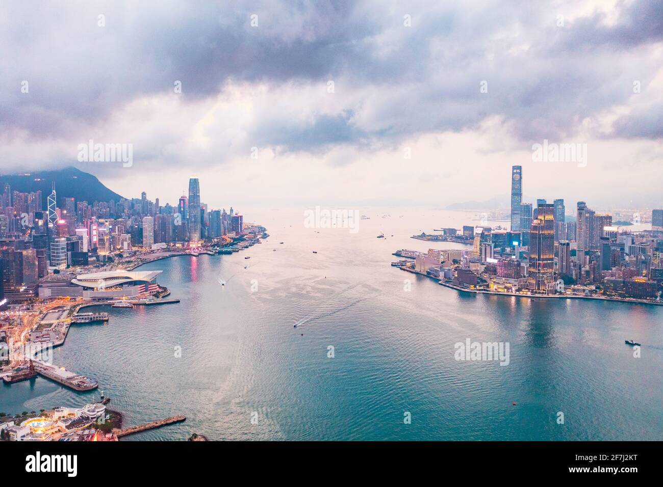 Epic aerial view of night scene of Victoria Harbour, Hong Kong, in