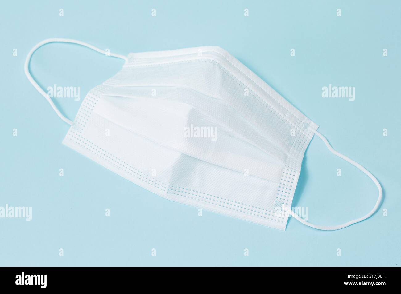 face mask, skyblue background Stock Photo