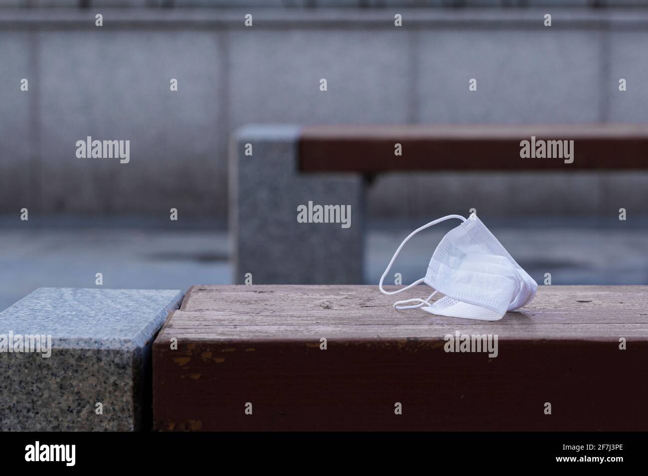 disposed mask on chair Stock Photo