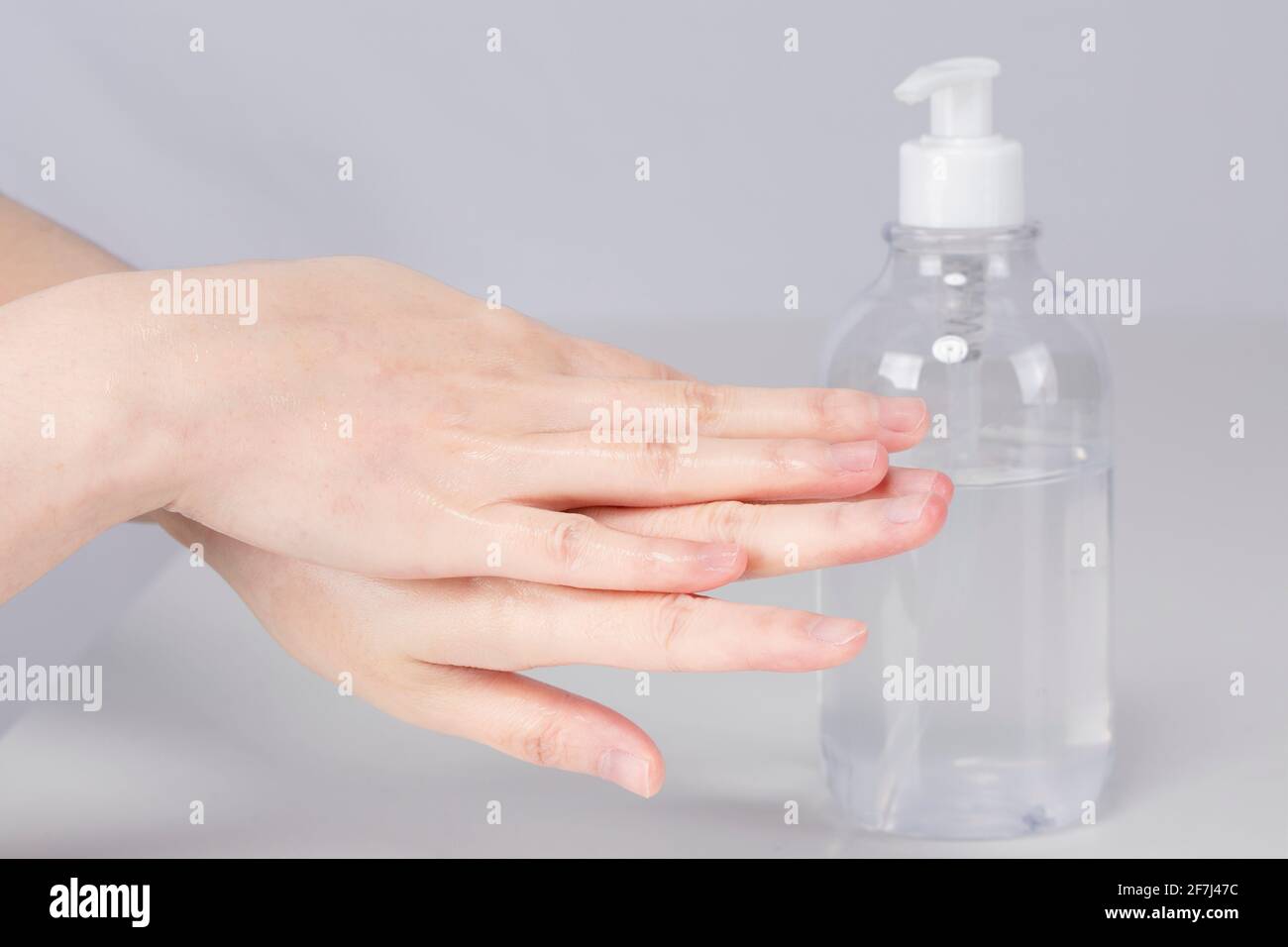 using hand sanitizer, disinfect hands Stock Photo Alamy