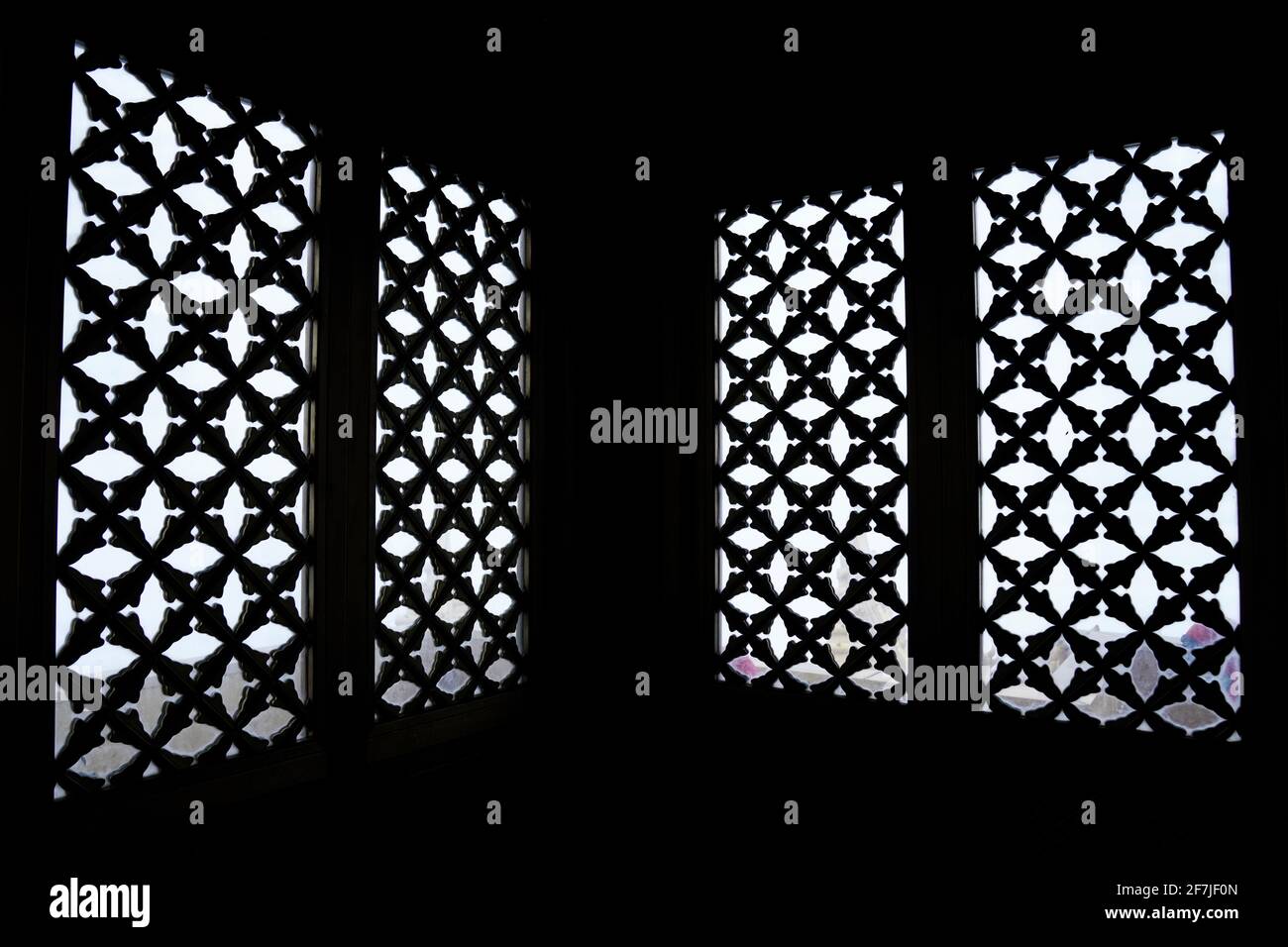 Light comes through bars of wooden window in a temple Stock Photo Alamy