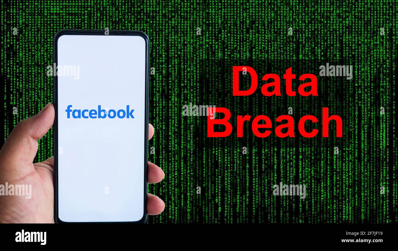 Facebook App aginst Leak text in red and Matrix-style green background. 533 Million Facebook User's personal information has been leaked online on Sat Stock Photo