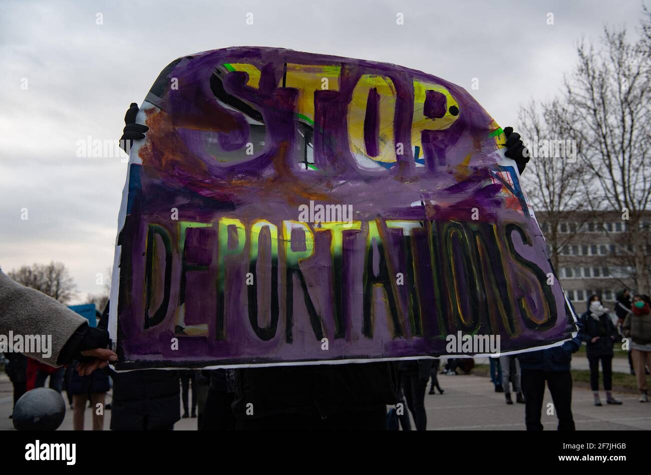 07 April 2021, Brandenburg, Schönefeld: Protesters at Berlin's BER airport decry the deportations of Afghans out of Germany on Thursday. Photo: Paul Zinken/dpa-Zentralbild/dpa Stock Photo