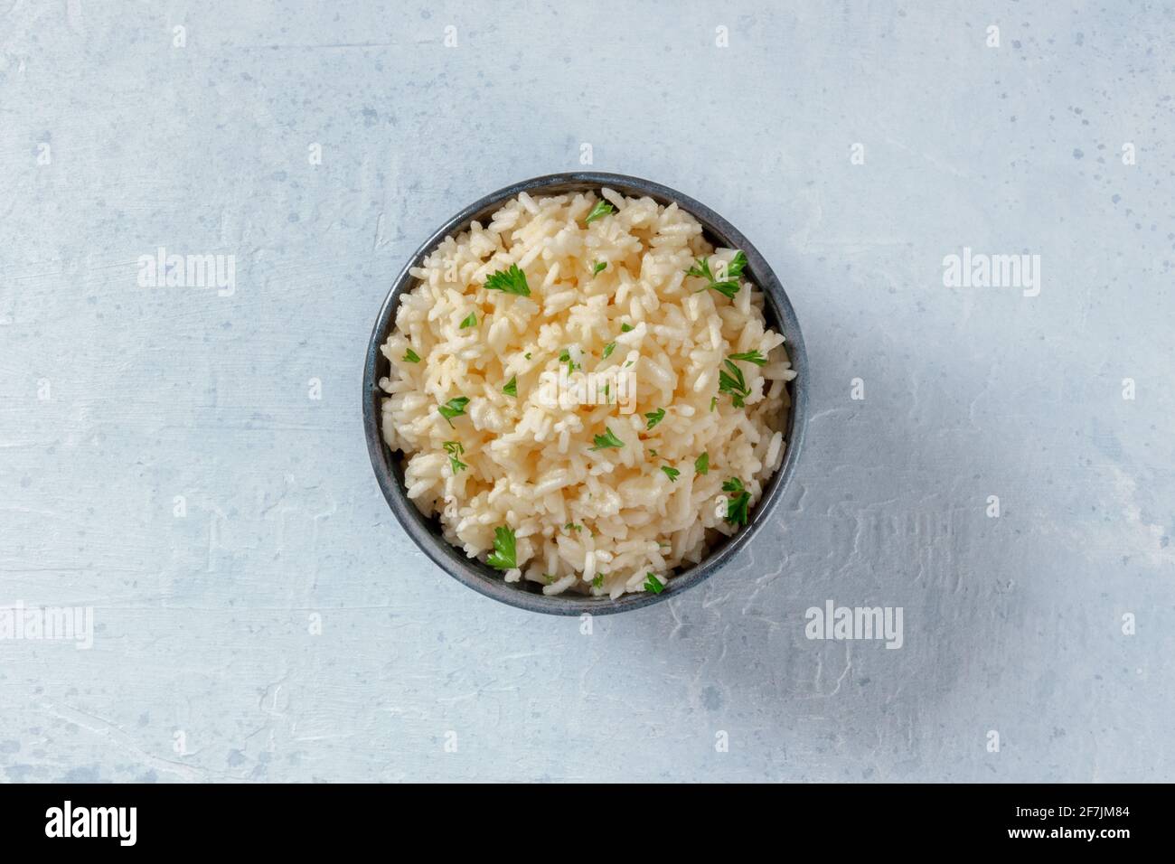 Rice with parsley, overhead shot Stock Photo - Alamy