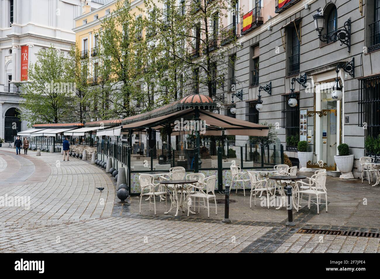 Madrid, Spain - April, 2, 2021: Cosy and Beautiful Restaurant in Plaza of Oriente in historic centre during the pandemic of covid-19 during Easter Wee Stock Photo