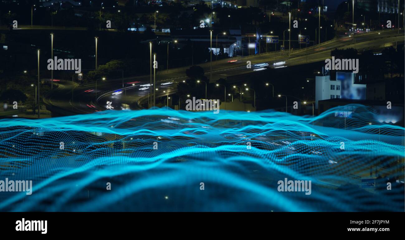Composition of blue waves over a cityscape in background Stock Photo