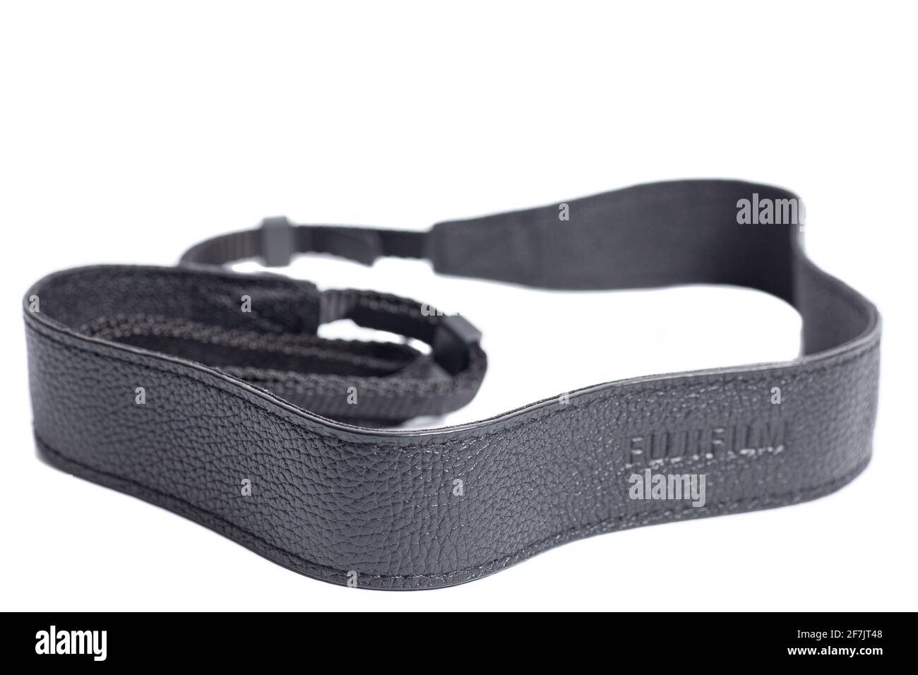 Black leather camera strap isolated on white background Stock Photo - Alamy
