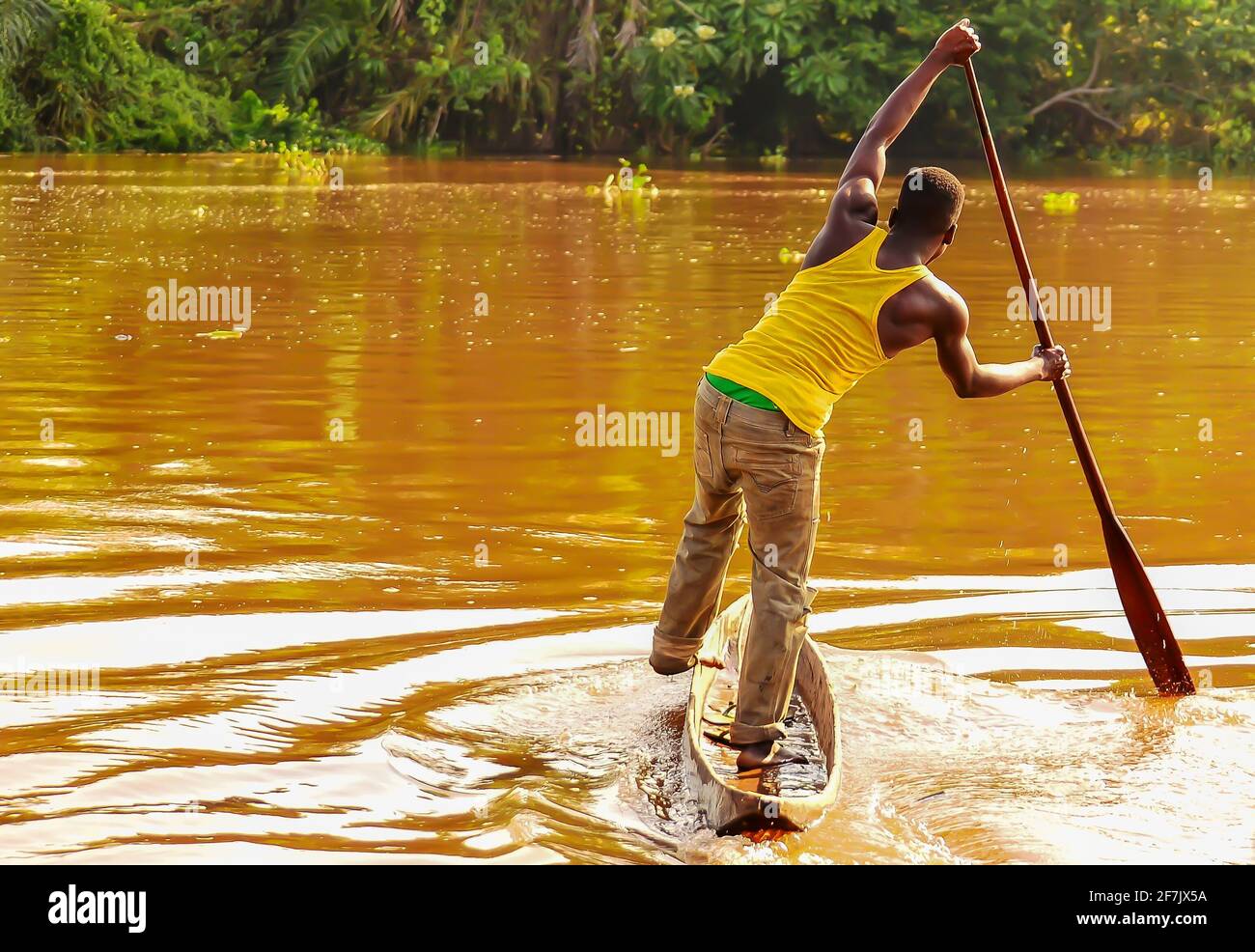 Riding the River, rainforest villager selling fish to the passengers on a barge travelling from Kisangani to Kinshasa, Democratic Republic of Congo Stock Photo