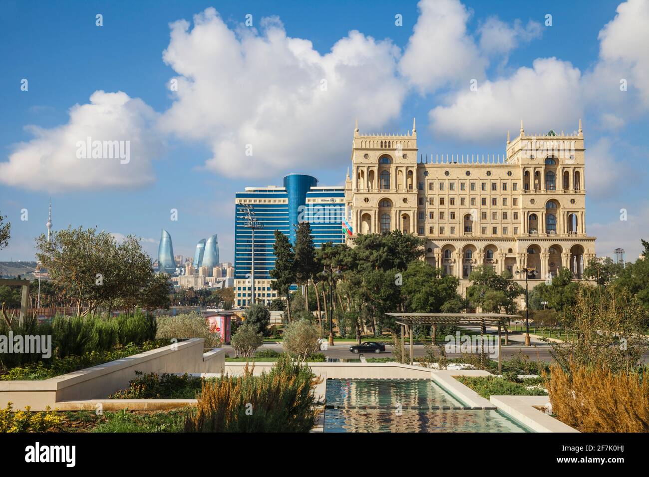Azerbaijan, Baku, Govenment House, Hilton Hotel with Flame Towers in background Stock Photo