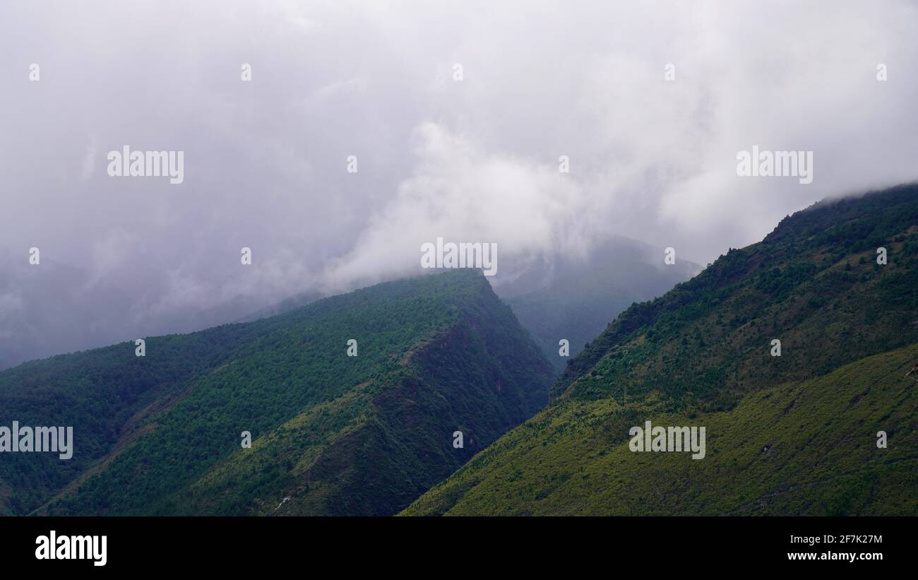 Cloudy sky on mountains hi-res stock photography and images - Alamy