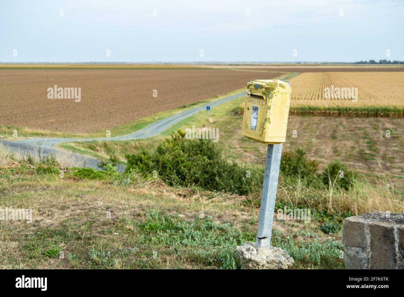 An old post box in a rural area in France close as a symbol for accessibility Stock Photo