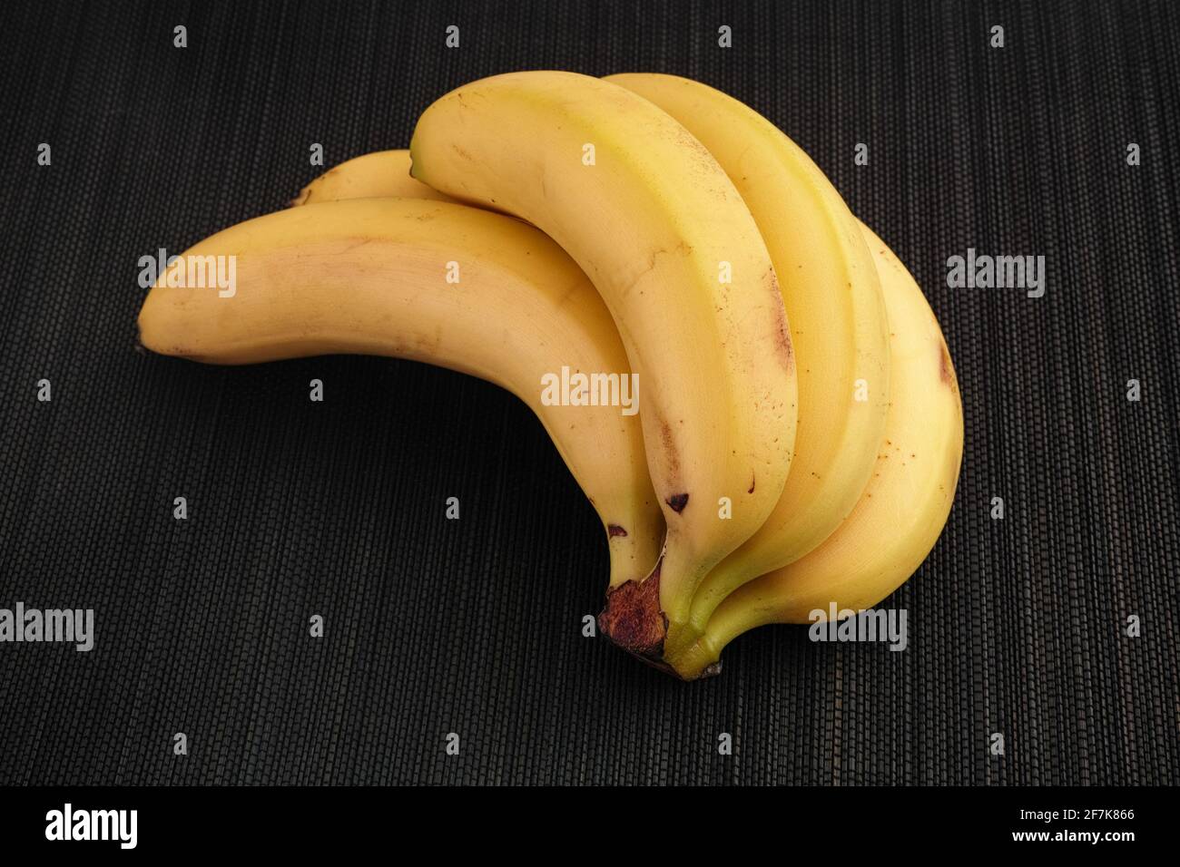 Bunch of bananas. Low key. Close up. Stock Photo