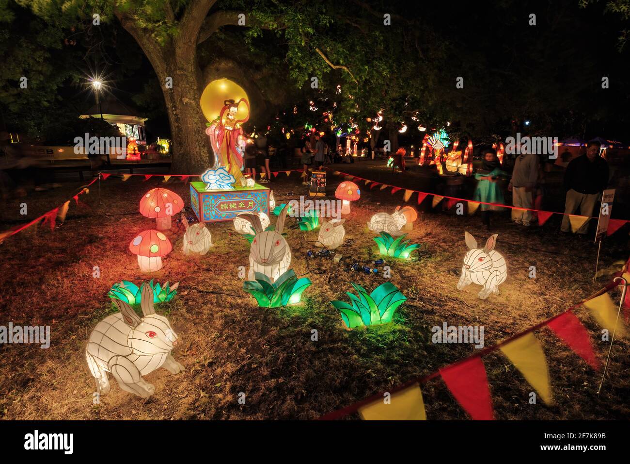A Chinese lantern display in a park at night to celebrate Chinese New Year. Chang'e, the Moon Goddess, is surrounded by rabbits Stock Photo
