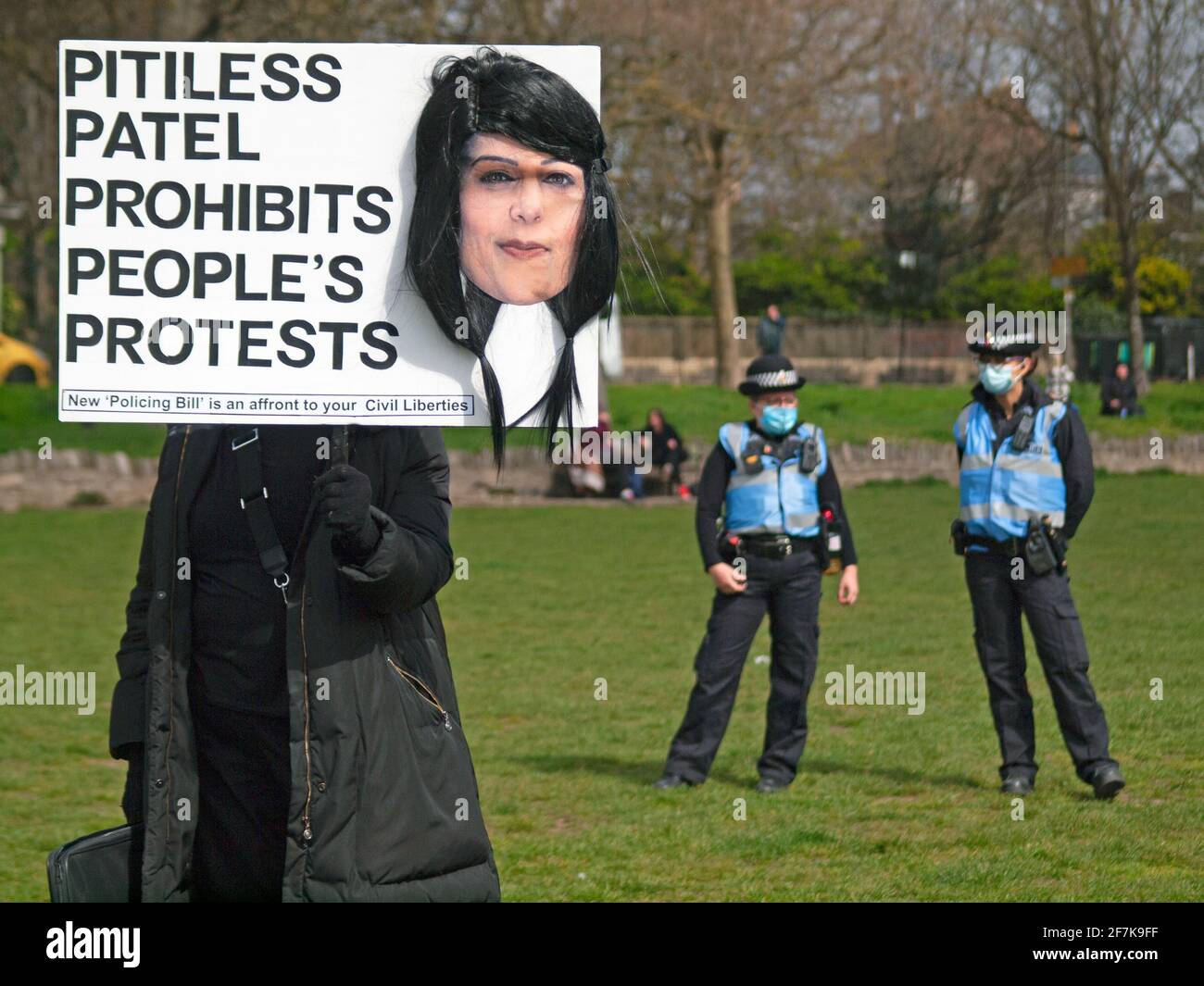 During a Kill the Bill protest in Brighton a placard regarding the Home Secretary is held aloft Stock Photo