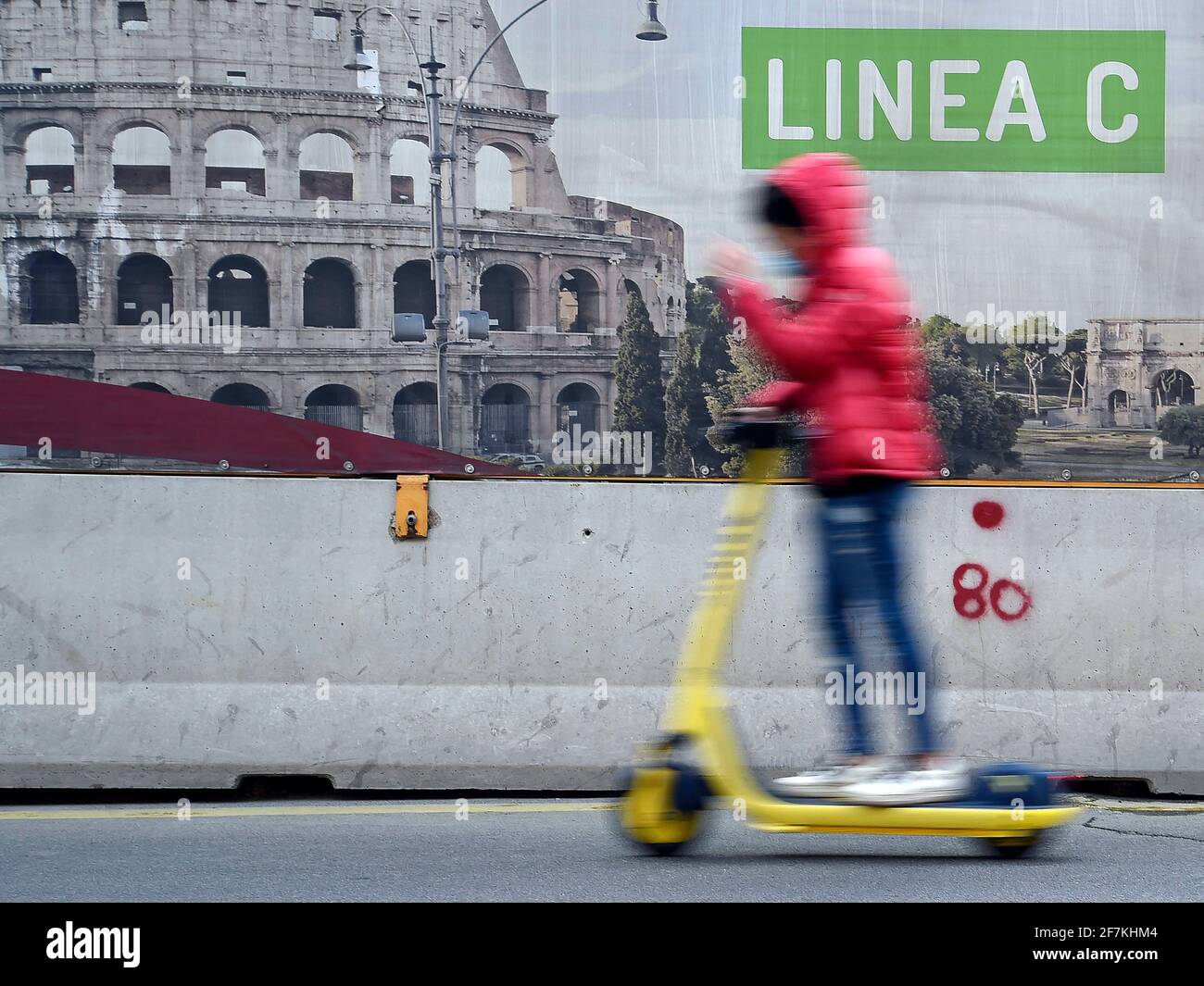 Italy, Rome, March 13, 2021 : People riding an electric scooter near the Coliseum area   Photo © Fabio Mazzarella/Sintesi/Alamy Stock Photo Stock Photo