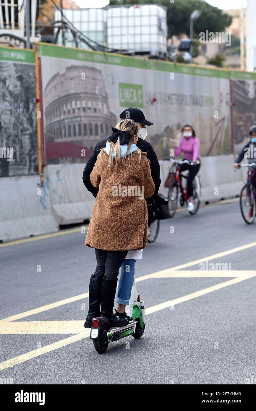 Ordinary life in the old district of Istanbul. two guys are riding along a  narrow street on one electric scooter. Turkey , Istanbul - 21.07.2020 Stock  Photo - Alamy