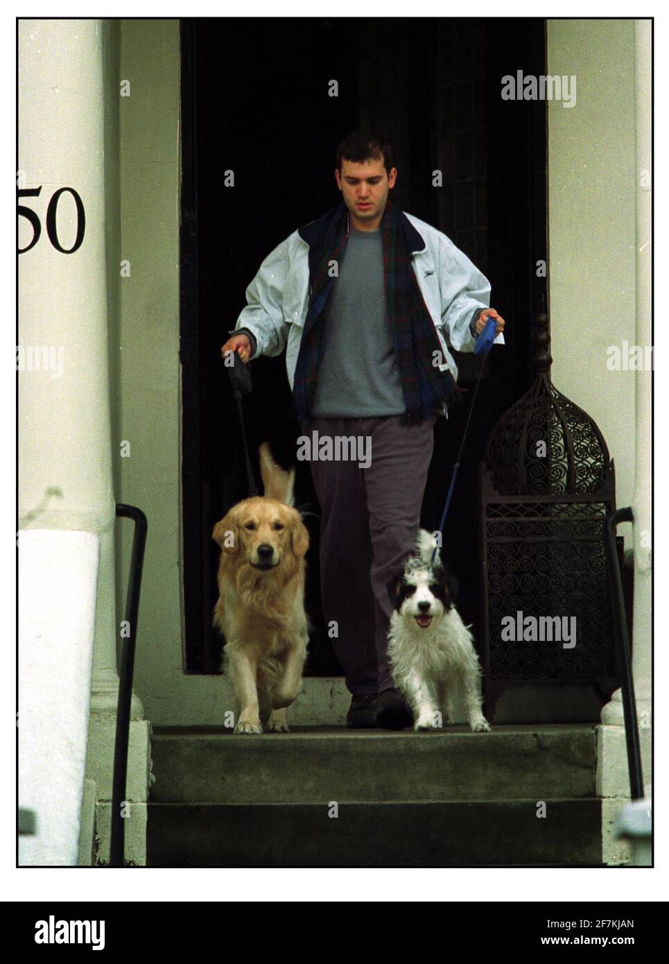 Peter Mandleson's partner Reinaldo da Silva  leaving their Notting Hill flat  with dogs5/2/2001pic David Sandison 5/2/2001 Stock Photo