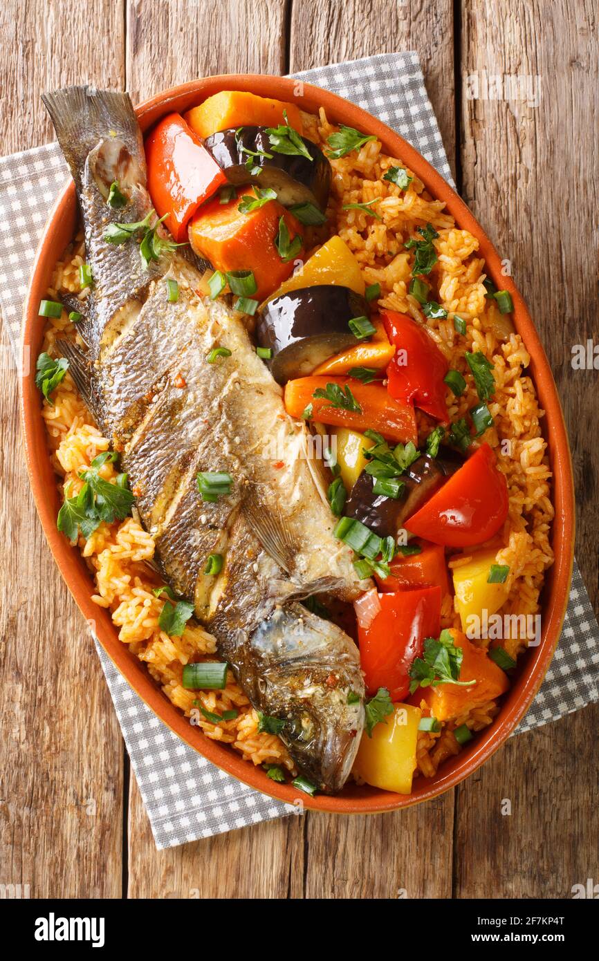 Thieboudienne Ceebu Jen Poisson au Riz a delicious one-pot meal with rice,  fish stew and a variety of vegetables that is popular in Senegal closeup on  Stock Photo - Alamy