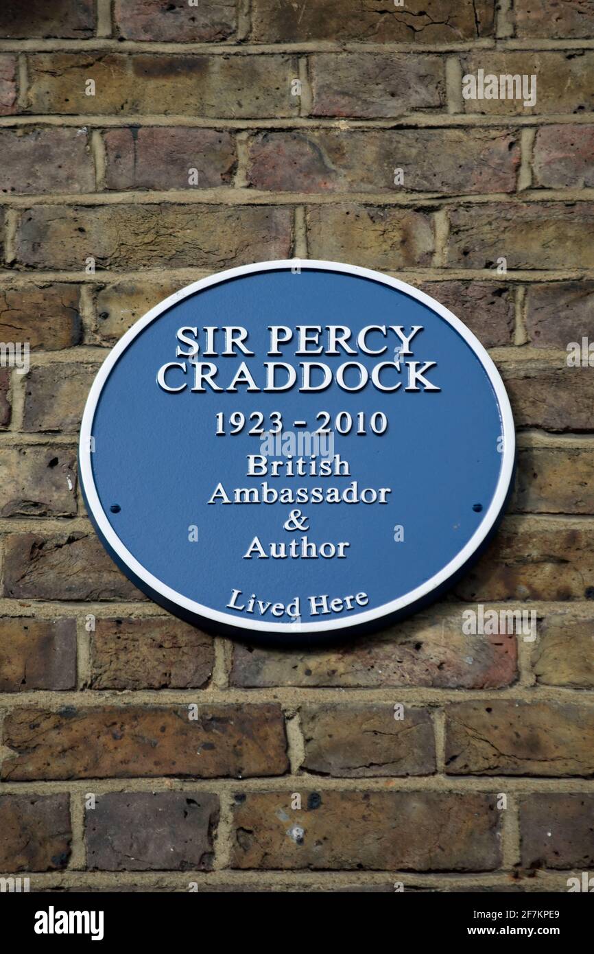 blue plaque marking a home of british ambassador and author sir percy craddock, in twickenham, middlesex, england Stock Photo