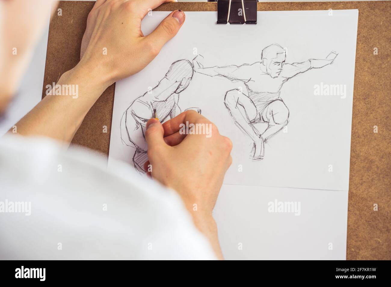 Artist drawing figure pencil sketches. Artwork background Stock Photo