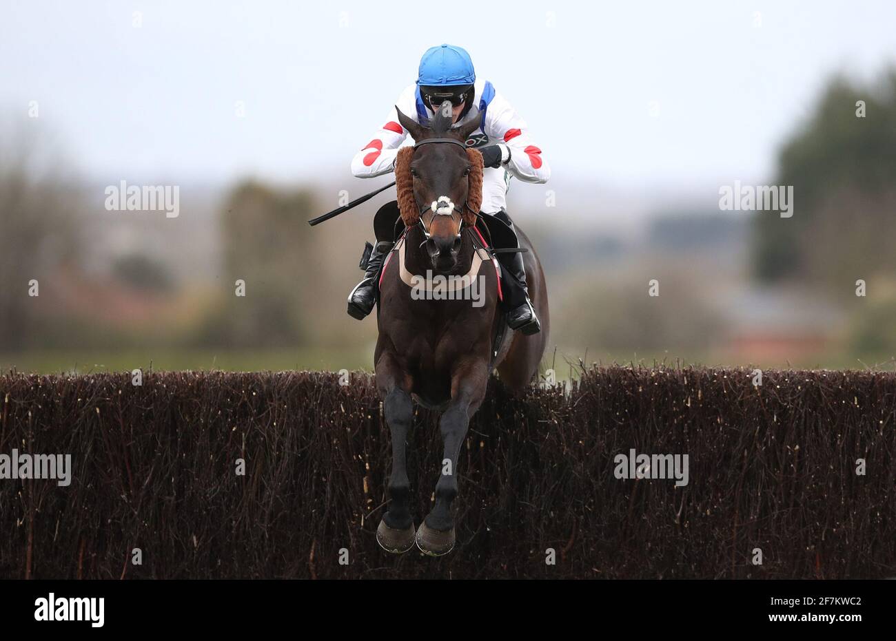 Clan Des Obeaux ridden by Harry Cobden jumps the last on the way to winning the Betway Bowl Chase during the Liverpool NHS Day of the 2021 Randox Health Grand National Festival at Aintree Racecourse, Liverpool. Picture date: Thursday April 8, 2021. Stock Photo