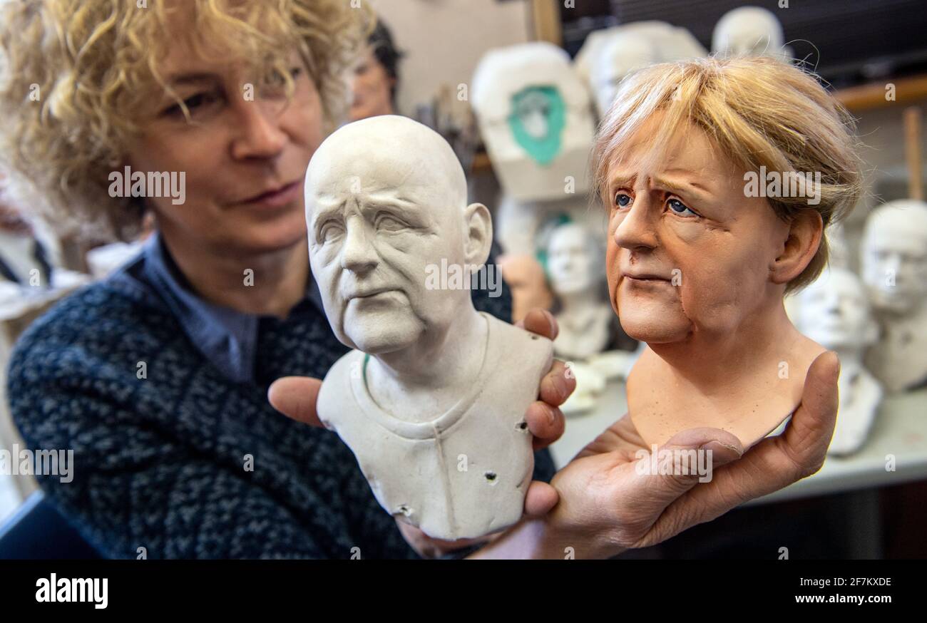 Lichtenstein, Germany. 08th Apr, 2021. In her workshop in Lichtenstein, Brigitte Schneider is busy working on portrait heads depicting German Chancellor Angela Merkel. In her studio she makes elaborate hand puppets, busts and marionettes. Among the sculptures are many prominent faces that celebrate their grand entrance in political cabaret or puppet theatre, for example. Credit: Hendrik Schmidt/dpa-Zentralbild/ZB/dpa/Alamy Live News Stock Photo