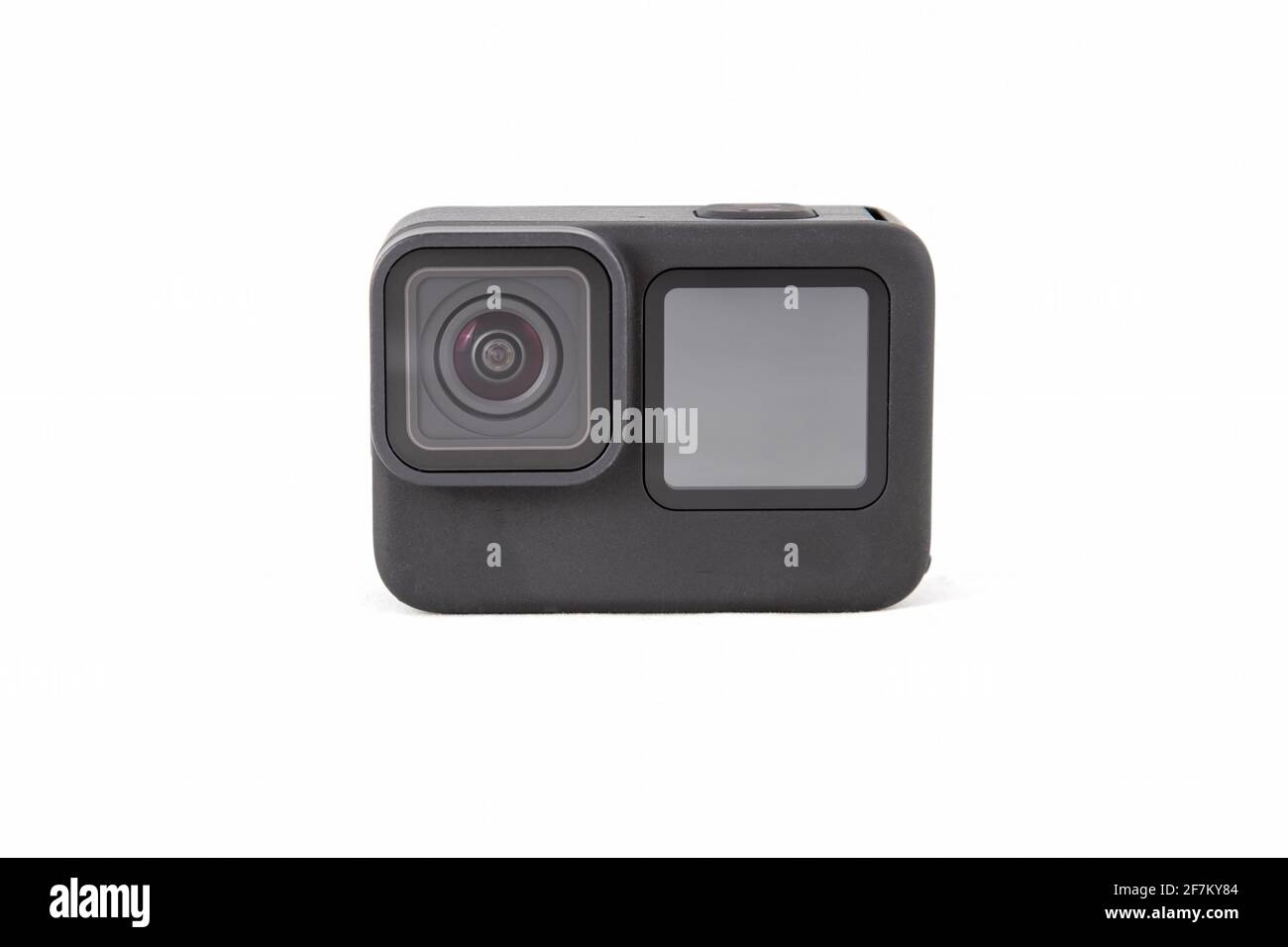 New 4K action camera in black color. Isolated white background.. fromt view. Stock Photo