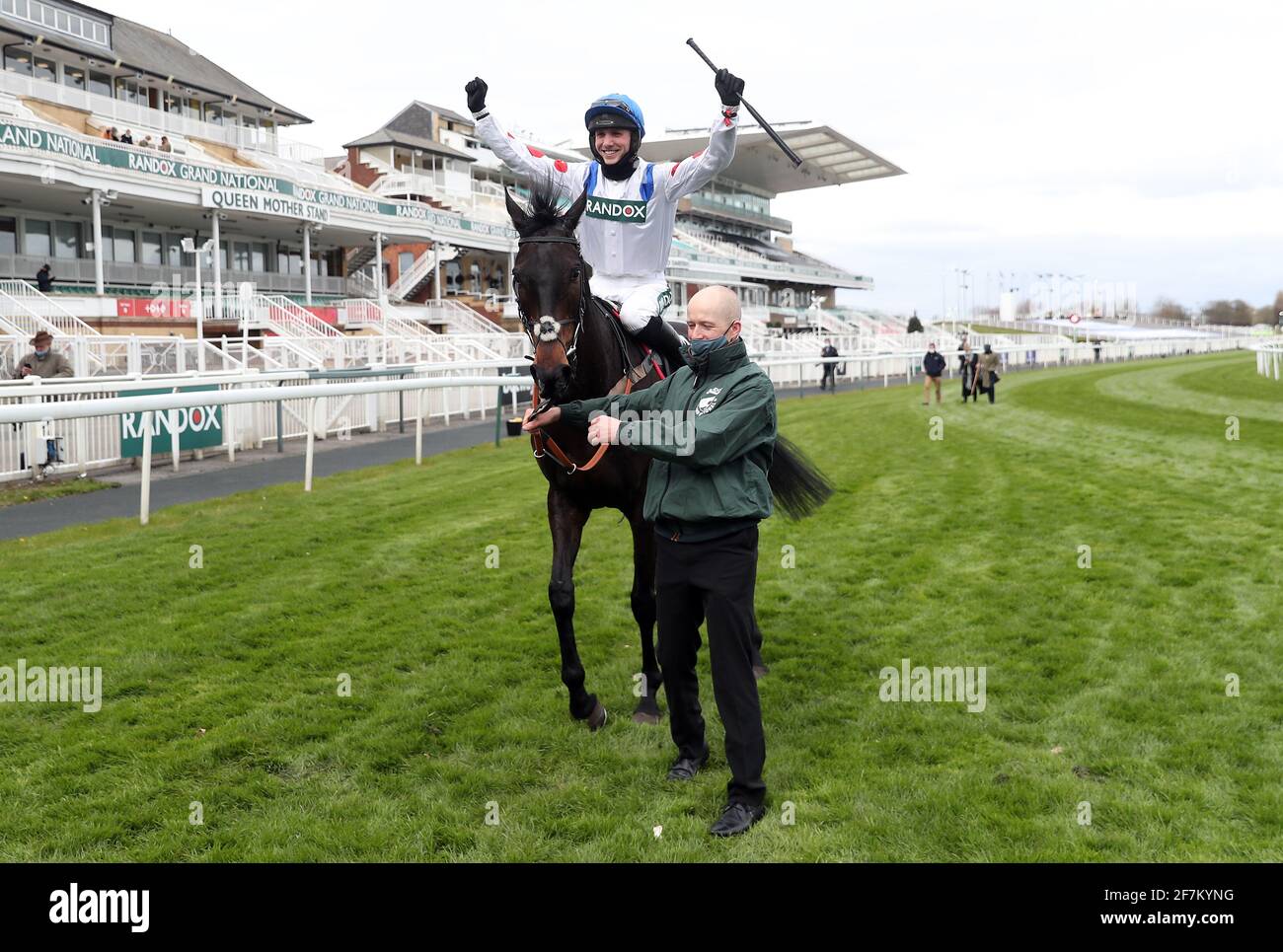 Jockey Harry Cobden celebrates winning the Betway Bowl Chase with Clan Des Obeaux on Liverpool NHS Day of the 2021 Randox Health Grand National Festival at Aintree Racecourse, Liverpool. Picture date: Thursday April 8, 2021. Stock Photo