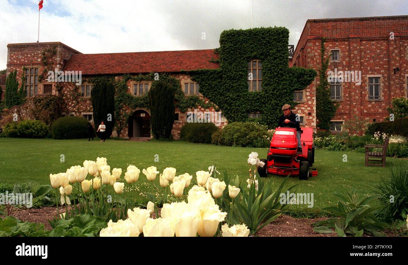 PREPARATIONS FOR THE OPENING OF THE GLYNDEBOURNE SEASON.ONE OF THE GARDNERS WITH THE NEW LAWNMOWER, CUTTING THE GRASS, ON WHICH THOUSANDS OF PICNICS WILL BE EATEN DURING THE SEASON. Stock Photo