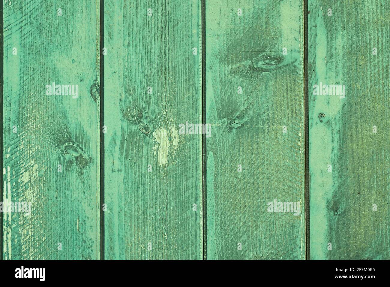 Wooden background with green colored planks Stock Photo