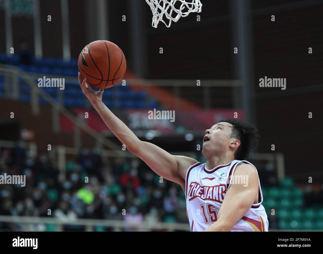 210408) -- ZHUJI, April 8, 2021 (Xinhua) -- Wang Yibo of Zhejiang Golden  Bulls goes for a layup during the 54th round match between Zhejiang Golden  Bulls and Fujian Sturgeons at the