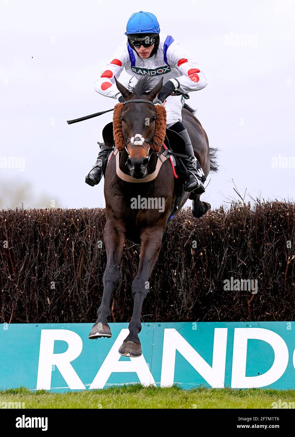 Clan Des Obeaux ridden by Harry Cobden clears the last on their way to winning the Betway Bowl Chase during Liverpool NHS Day of the 2021 Randox Health Grand National Festival at Aintree Racecourse, Liverpool. Picture date: Thursday April 8, 2021. Stock Photo