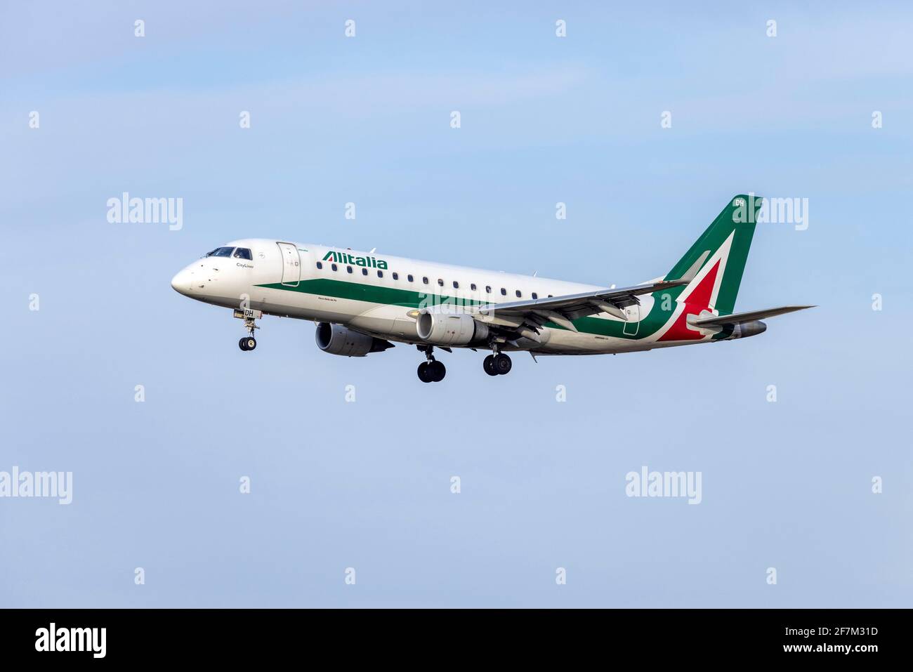 Alitalia CityLiner Embraer 175STD (REG: EI-RDH) on short finals, arriving from Rome, Fiumicino. Stock Photo