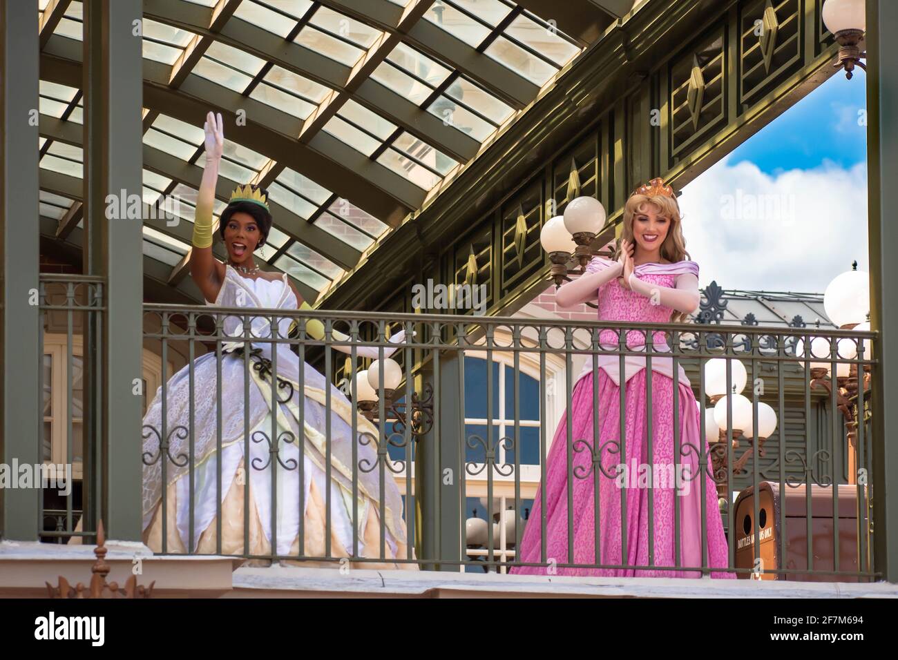 Orlando, Florida. August 04, 2020. Thiana and Aurora waving from the balcony at Walt Disney World Railroad at Magic 400 Stock Photo
