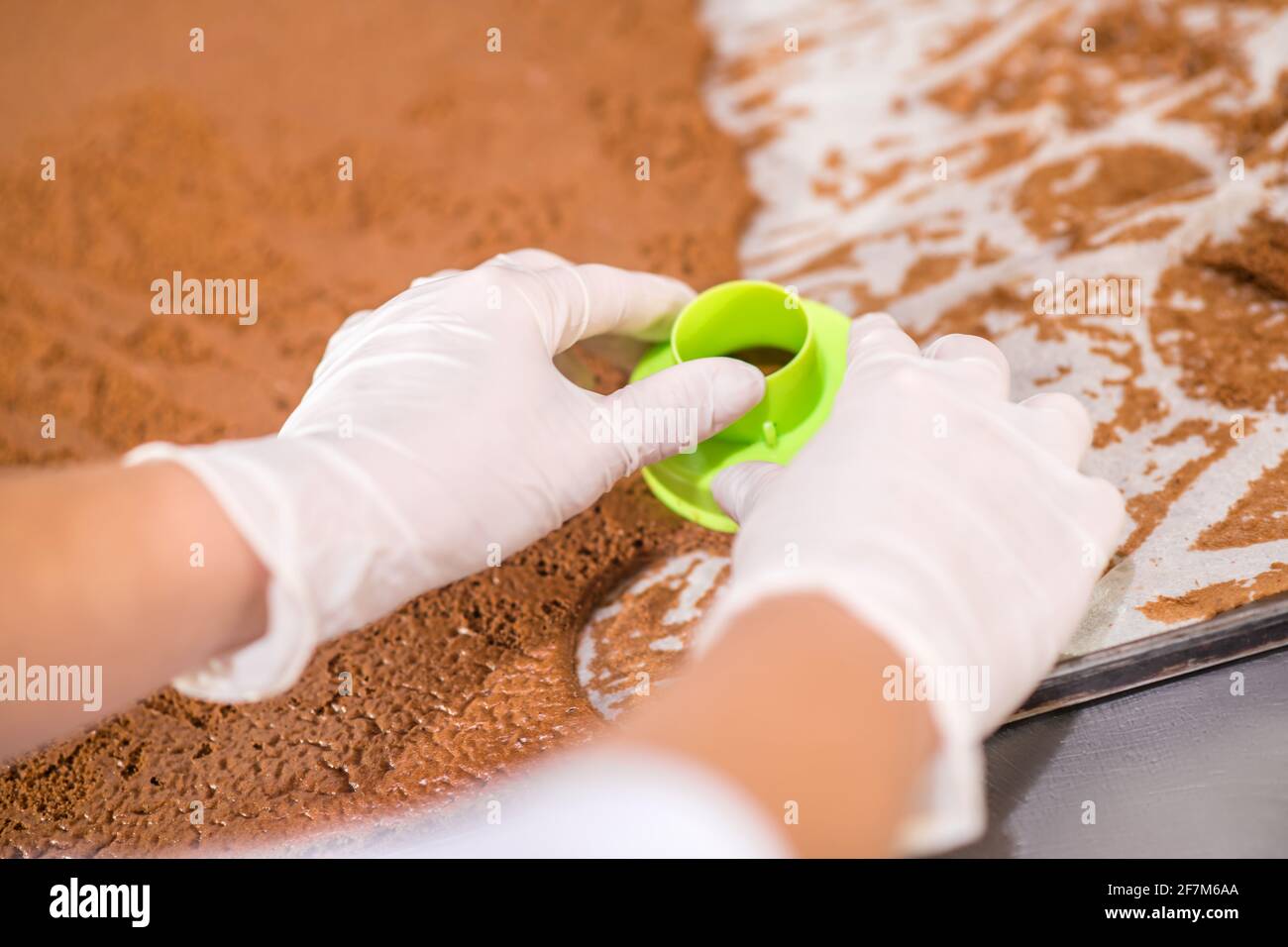 Hands squeezing out biscuit dough in round shape Stock Photo Alamy