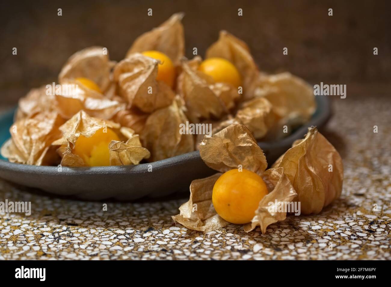 Heap of Golden Berries on ceramic dish Stock Photo