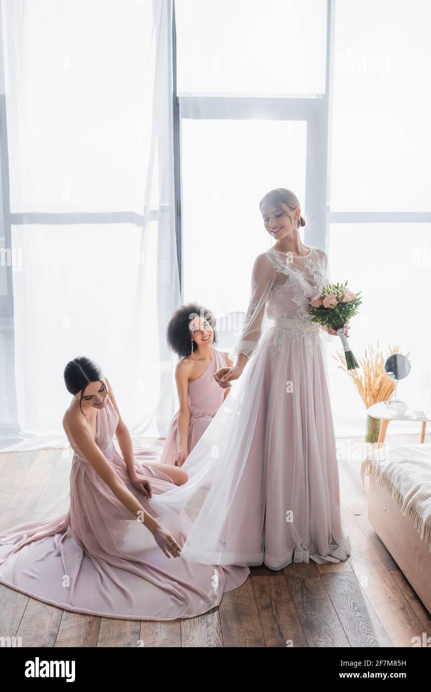Attractive bride bridesmaids in dresses hi-res stock photography and ...