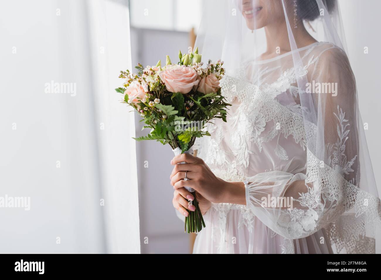 African bride holding bouquet hi-res stock photography and images - Alamy