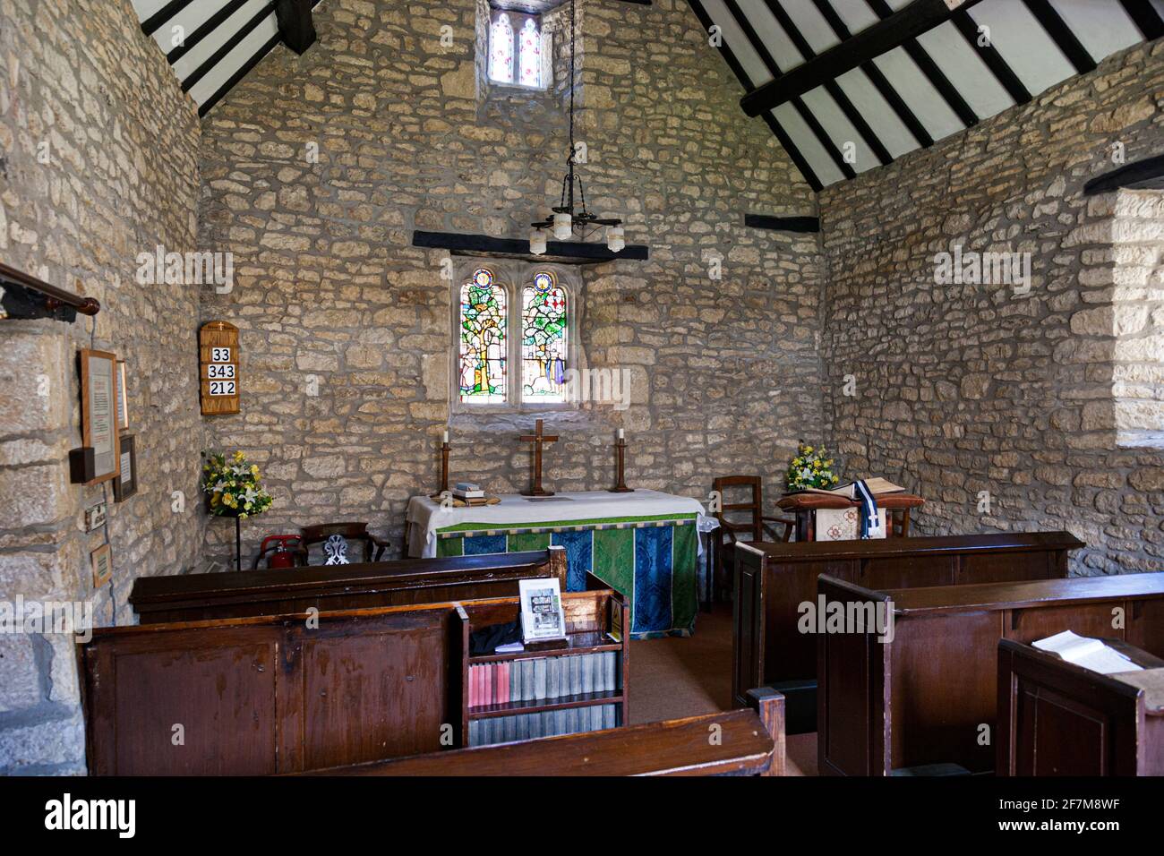 Simple interior of the chapel in the courtyard of the Perry & Dawes Almshouses (1638) in the Cotswold town of Wotton under Edge, Gloucestershire UK Stock Photo