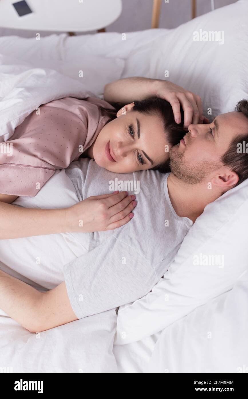 Adult Woman Lying On Chest Of Husband On Bed Stock Photo Alamy adult-woman-lying-on-chest-of-husband-on-bed-stock-photo-alamy