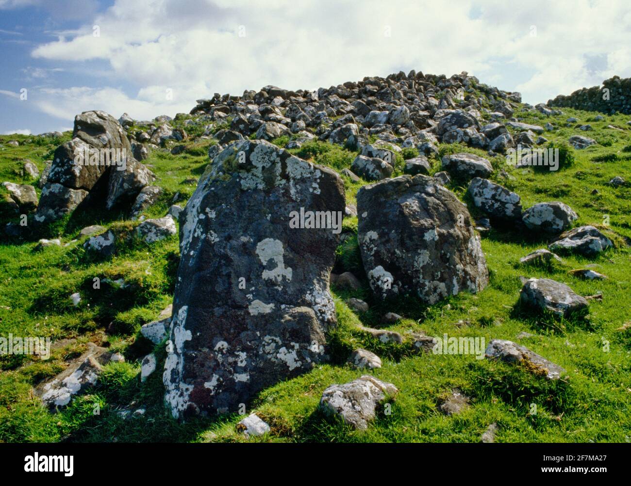 View E of Carn Liath (Balgown) Neolithic chambered tomb, Isle of Skye, Scotland, UK, showing remains of the Hebridean square cairn with edging stones. Stock Photo
