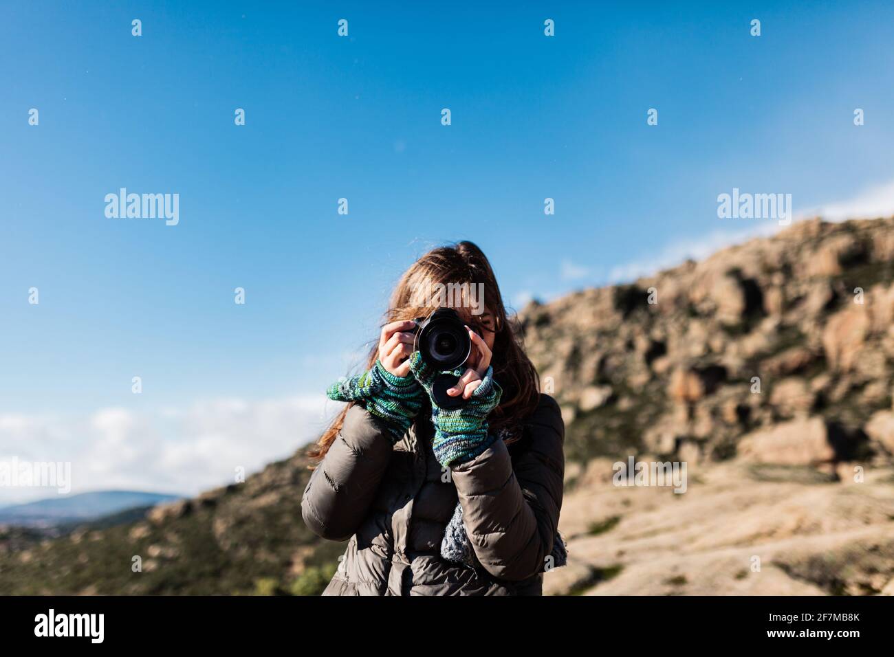 young woman taking photos in the nature Stock Photo - Alamy