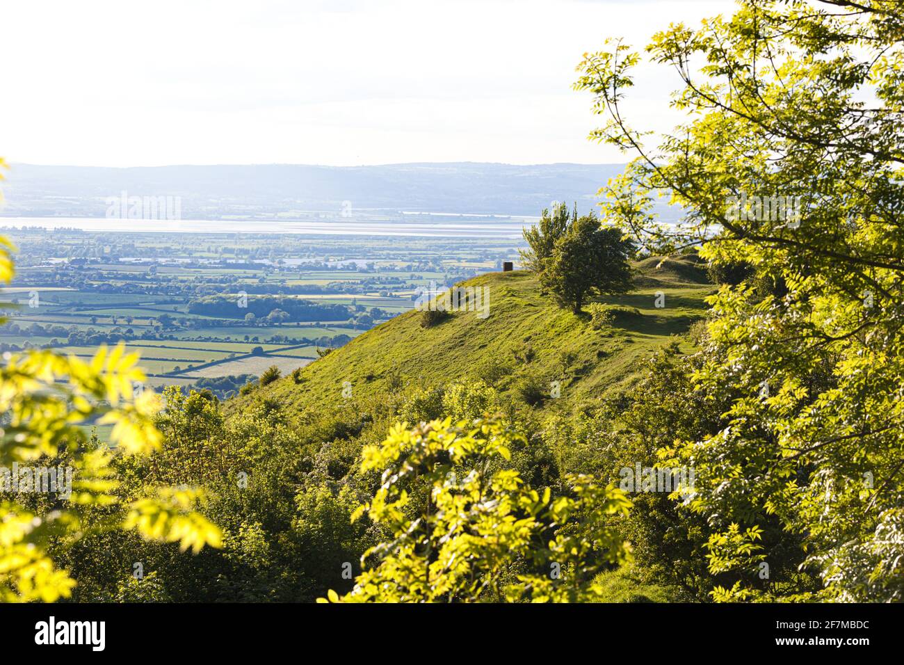 The viewpoint on the Cotswold scarp overlooking the Severn Vale at Frocester Hill, Gloucestershire UK Stock Photo