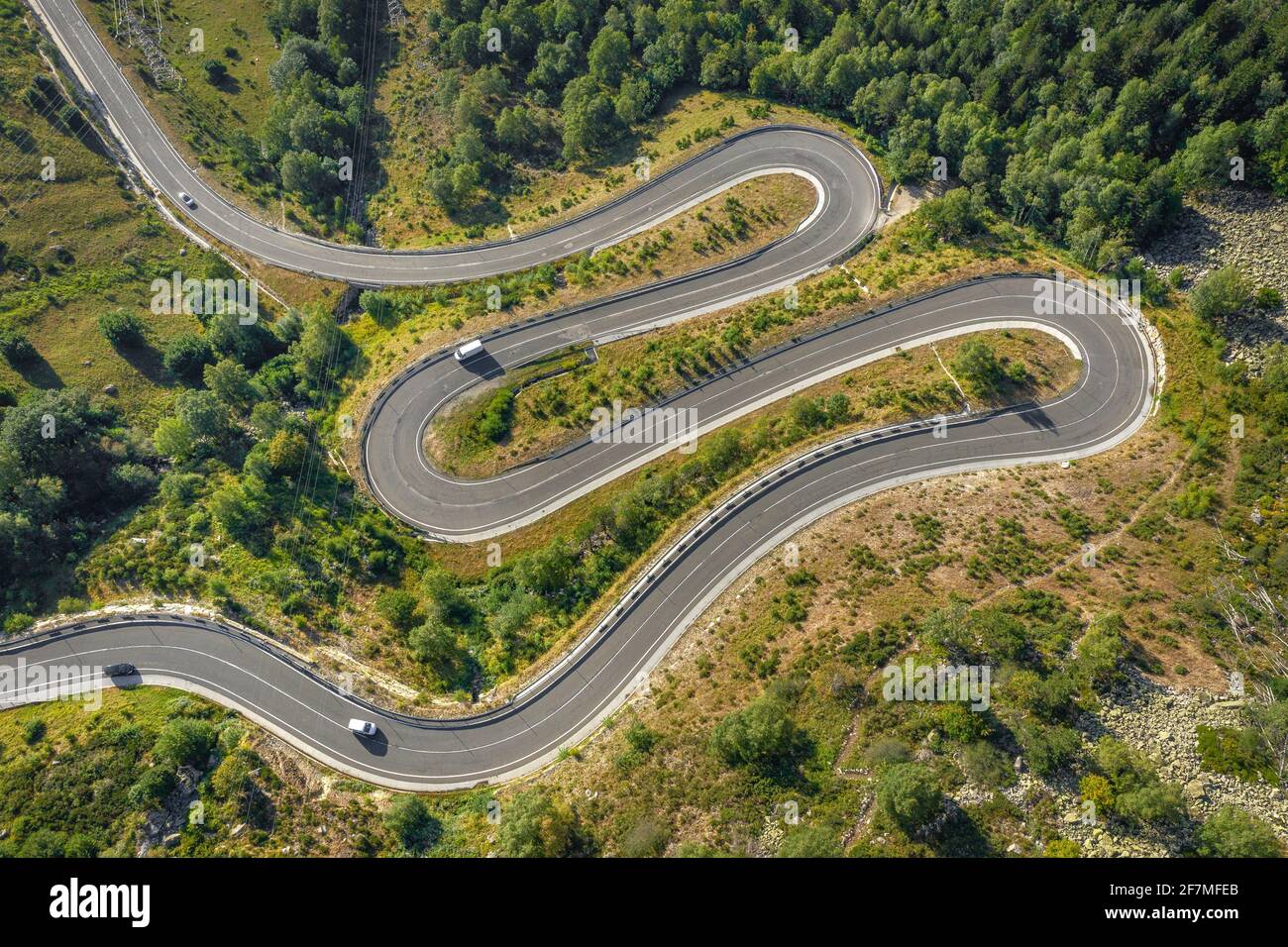 Aerial view of a curvy road going up the Bonaigua mountain pass in the Spanish Pyrenees (Pallars Sobrià, Catalonia, Spain, Pyrenees) Stock Photo