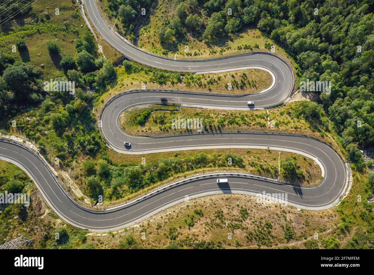 Aerial view of a curvy road going up the Bonaigua mountain pass in the Spanish Pyrenees (Pallars Sobrià, Catalonia, Spain, Pyrenees) Stock Photo