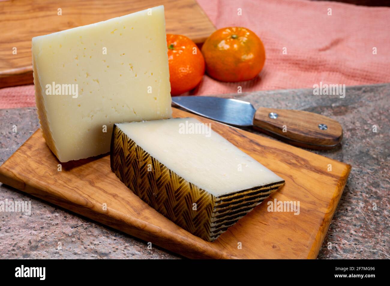Cheese collection, pieces of hard Spanish manchego curado, viejo and